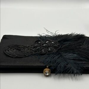 Elegant Black Mfaille Clutch 9 in wide 5in deep